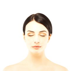 Close-up of a beautiful woman with eyes closed over white how to improve your memory