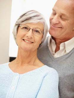 healthy older couple Lady Stretching