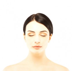 Close-up of a beautiful woman with eyes closed over white Close-up of a beautiful woman with eyes closed over white