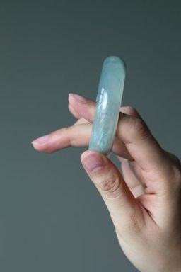 holding-jade pain relief