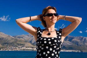 http://www.dreamstime.com/royalty-free-stock-photo-attractive-woman-outstretched-arms-outdoors-image6969555