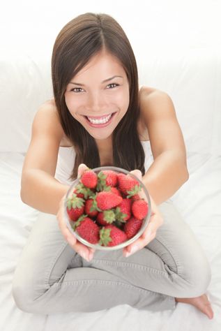 WomanOfferingBerries foods wrinkles